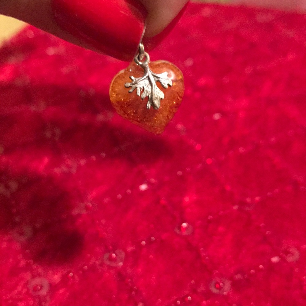 Authentic heart shaped amber with silver